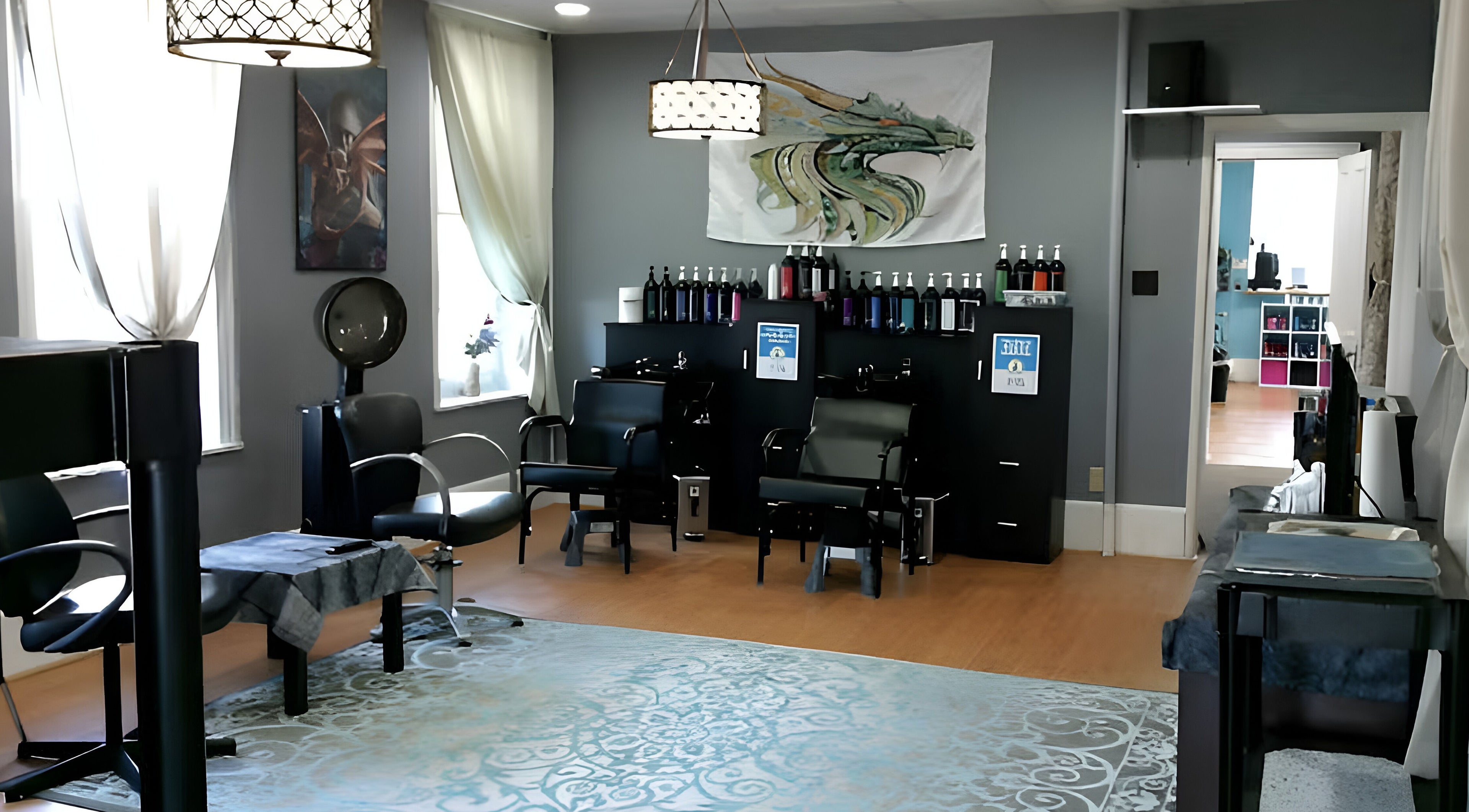 Interior of Troilo Style Family Hair Salon in Gilbertsville, Pennsylvania, US with modern chairs and decor.
