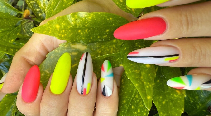 Colorful nail art design displayed on hands at Freedom Beauty Space, Dublin, County Dublin, IE.