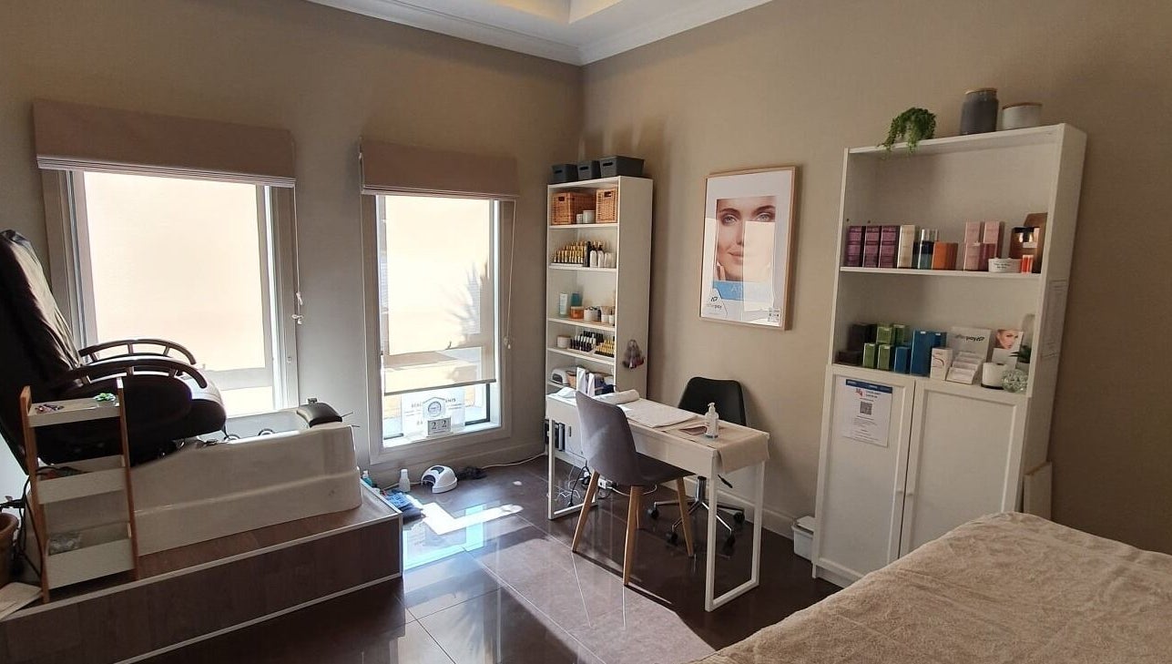 Relaxing interior of Virtue Beauty Studio in Littlehampton, South Australia with pedicure chair and beauty products.