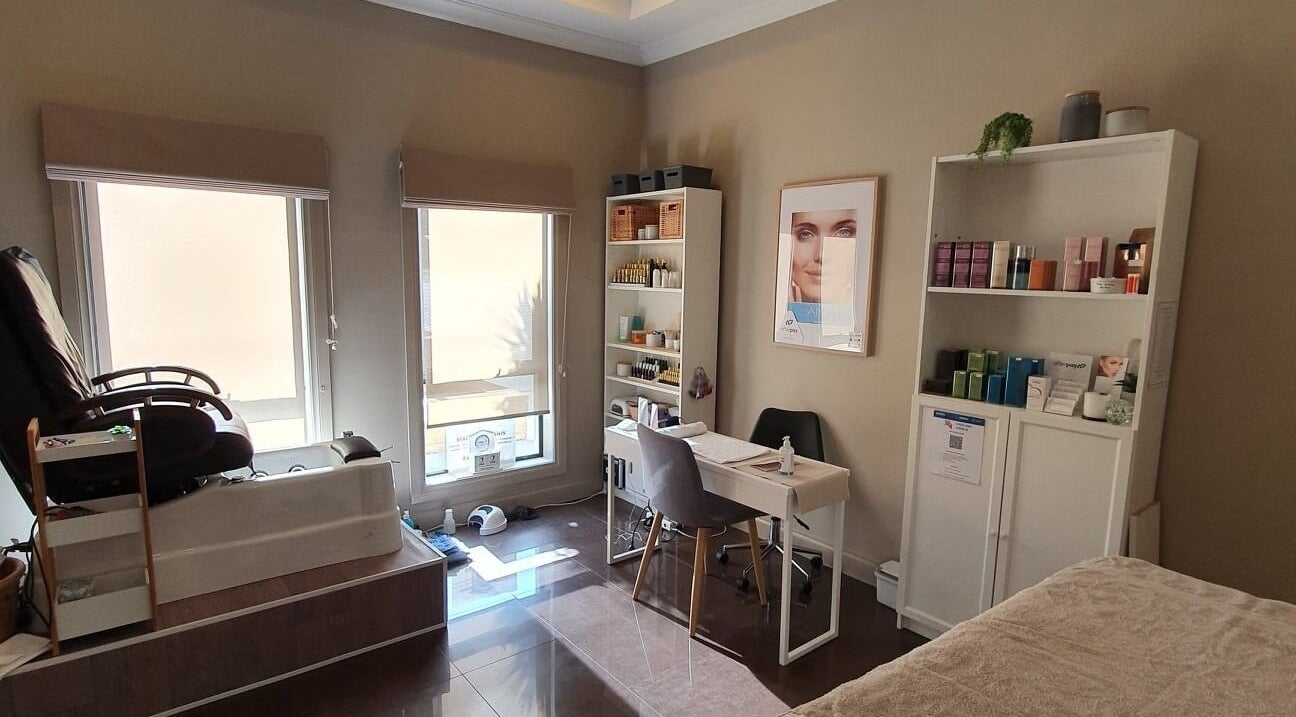 Relaxing interior of Virtue Beauty Studio in Littlehampton, South Australia with pedicure chair and beauty products.