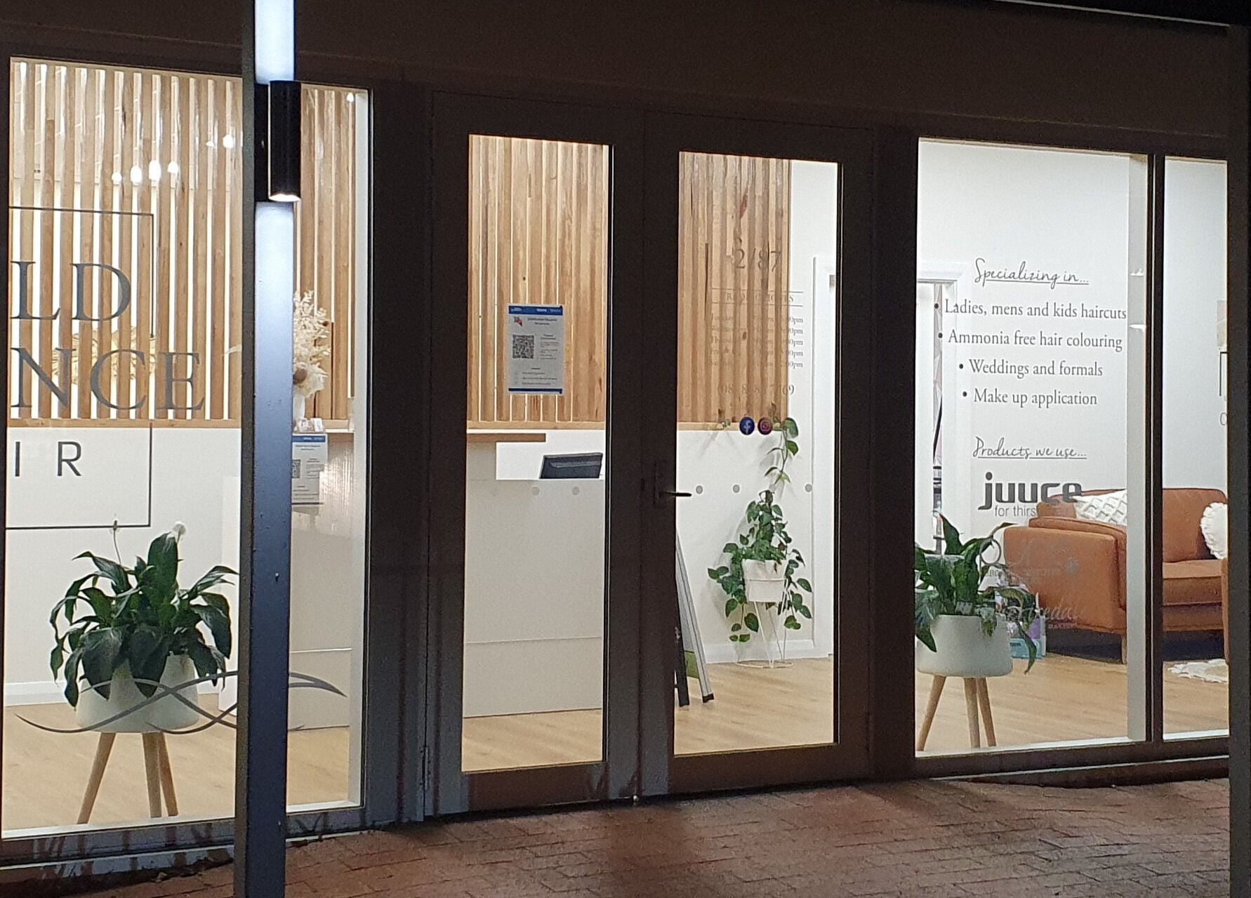 Virtue Beauty Studio entrance in Littlehampton, South Australia, showcasing stylish interior through glass windows.