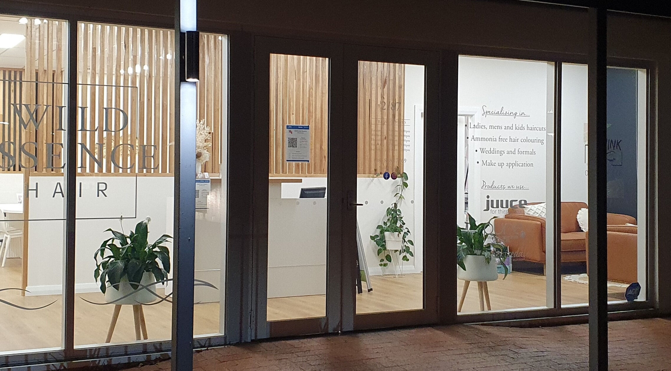 Virtue Beauty Studio entrance in Littlehampton, South Australia, showcasing stylish interior through glass windows.