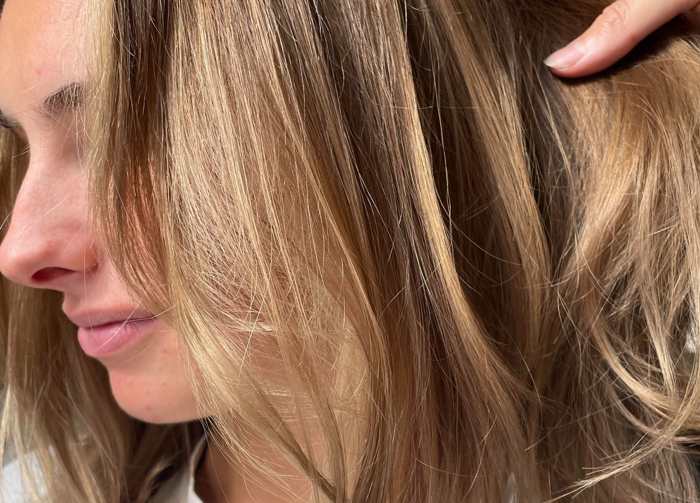 Close-up of vibrant hair highlighting at Addie Robins Hair, Melbourne, Victoria, AU.