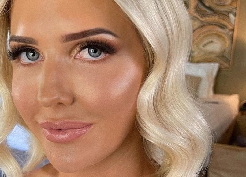 Blonde woman with radiant makeup at Tash's Tanning, Beldon, Western Australia, AU.