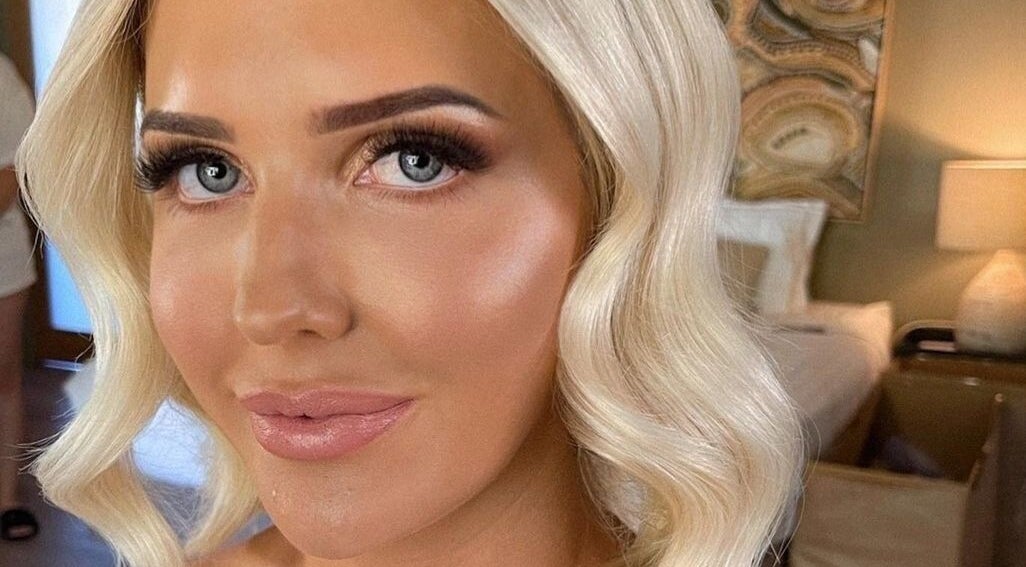 Blonde woman with radiant makeup at Tash's Tanning, Beldon, Western Australia, AU.