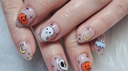 Halloween-themed nail art at Scratch Pad Nails in Waddington, England, GB with pumpkins, ghosts, and more.