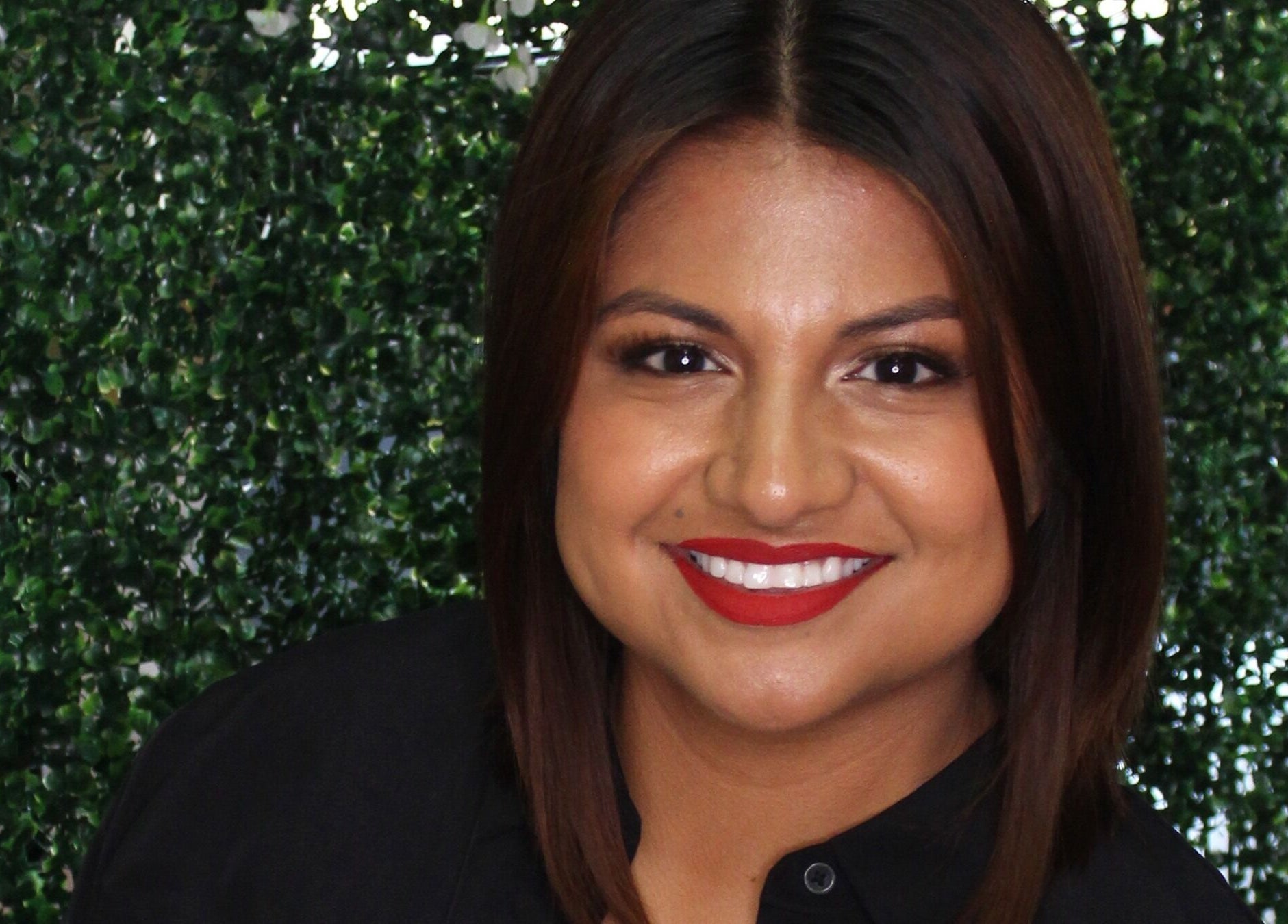 Warm welcome smile at Fringe Salon in Elkhart, Indiana, US, showcasing a friendly and inviting atmosphere.