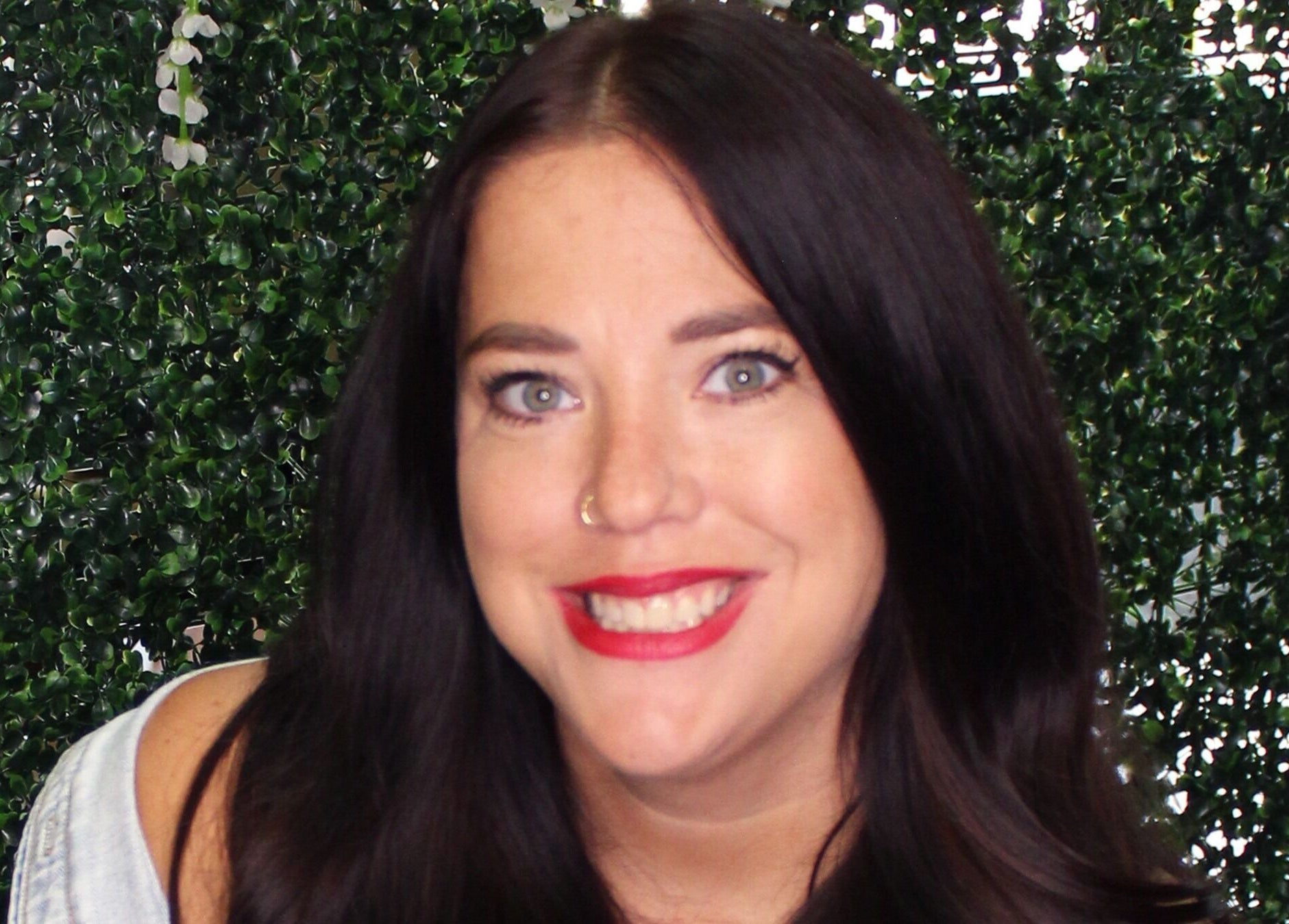 Bright smile at Fringe Salon, Elkhart, Indiana, US, showcasing welcoming ambiance.