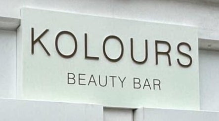 Kolours Beauty Bar sign at Edinburgh, Scotland, GB, showcasing elegant branding.