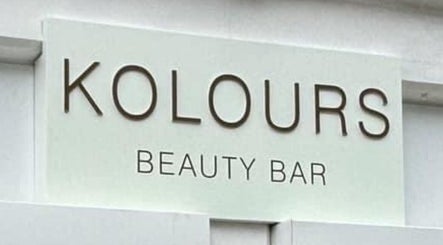 Elegant signage of Kolours Beauty Bar in Edinburgh, Scotland, GB, highlighting modern style and inviting atmosphere.