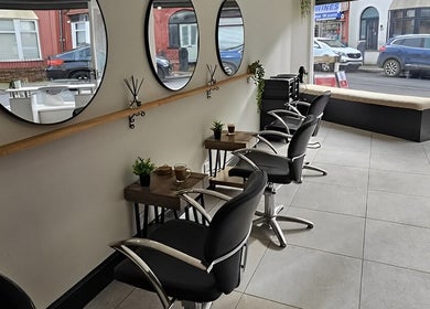 Modern salon seating with mirrors at Lashes By Fayedavies, Waterloo, England, GB.