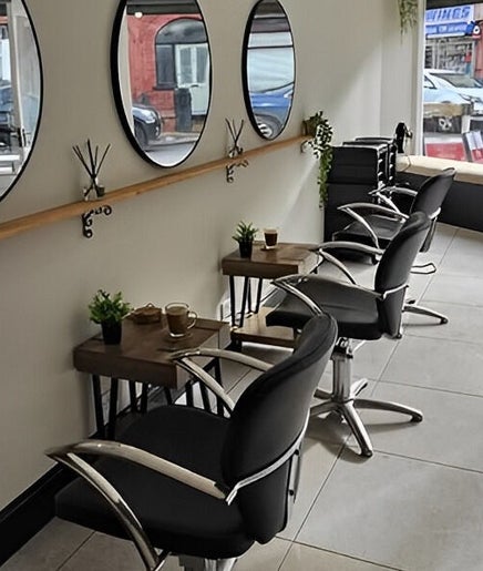 Modern salon seating with mirrors at Lashes By Fayedavies, Waterloo, England, GB.