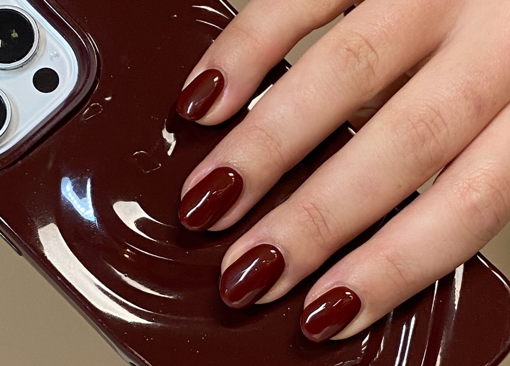 Chic burgundy gel nails at All Things Beauty By Amberx in Colwyn Bay, Wales, GB.