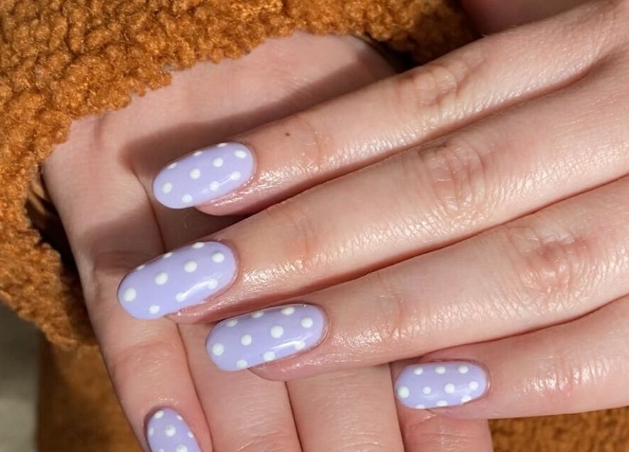 Stylish polka dot manicure at All Things Beauty By Amberx, Colwyn Bay, Wales, GB.