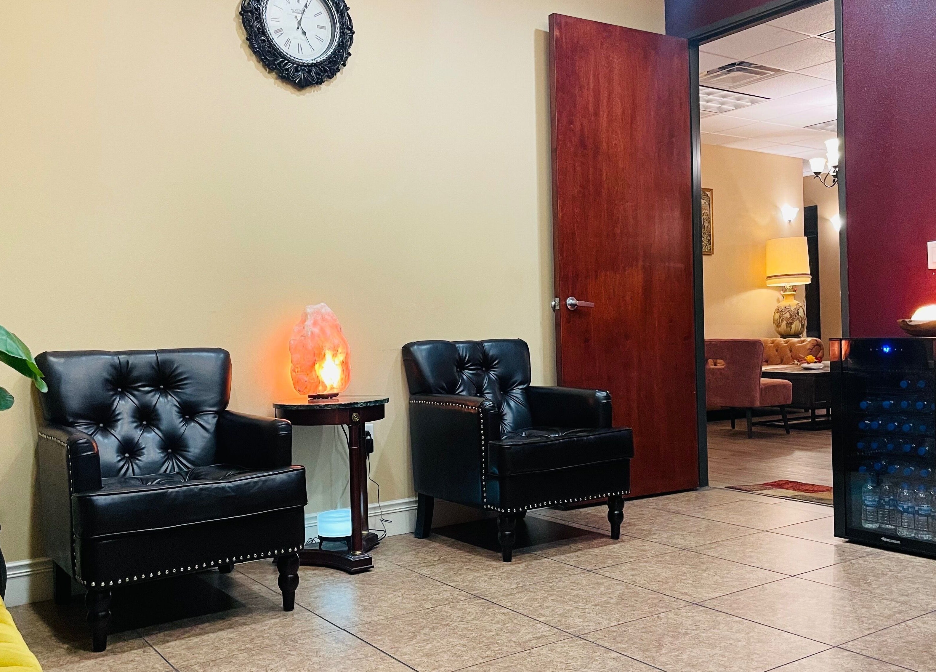 Cozy seating with salt lamp at Thai Euphorea Spa & Massage in Las Vegas, Nevada, US, offering a tranquil ambiance.