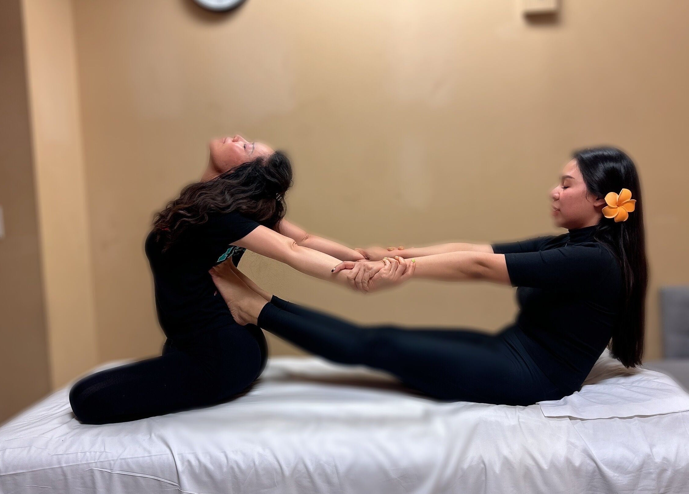 Therapist performing massage stretch at Thai Euphorea Spa & Massage, Las Vegas, Nevada, US.
