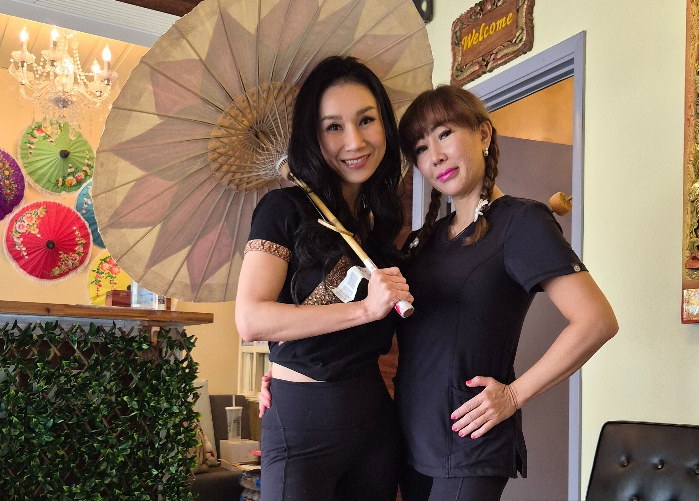Staff at Chiang Mai Thai Spa (Thai Euphorea Spa 2) in Las Vegas, Nevada, US with vibrant decor.