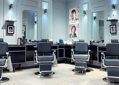 Stylish barber chairs at Hk Barbers - WTC Mall AD, Abu Dhabi, Abu Dhabi, AE, showcasing modern interior.