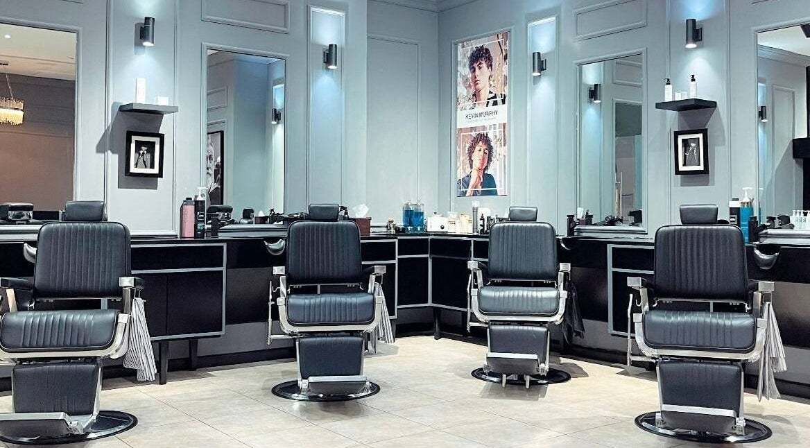 Stylish barber chairs at Hk Barbers - WTC Mall AD, Abu Dhabi, Abu Dhabi, AE, showcasing modern interior.
