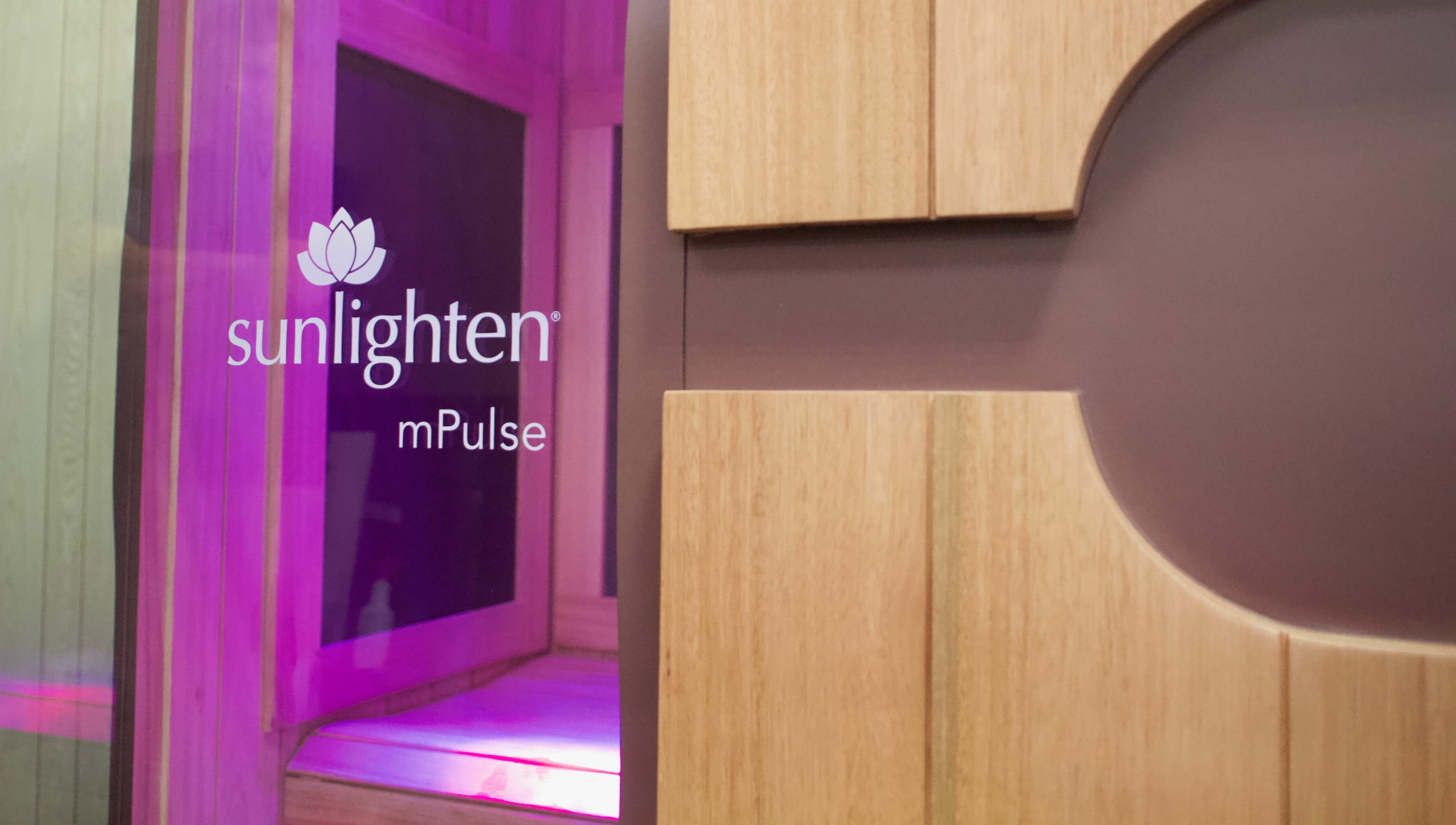 Konza Saunas infrared unit in Manhattan, Kansas, US, showcasing a modern, relaxing spa ambiance with warm lighting.