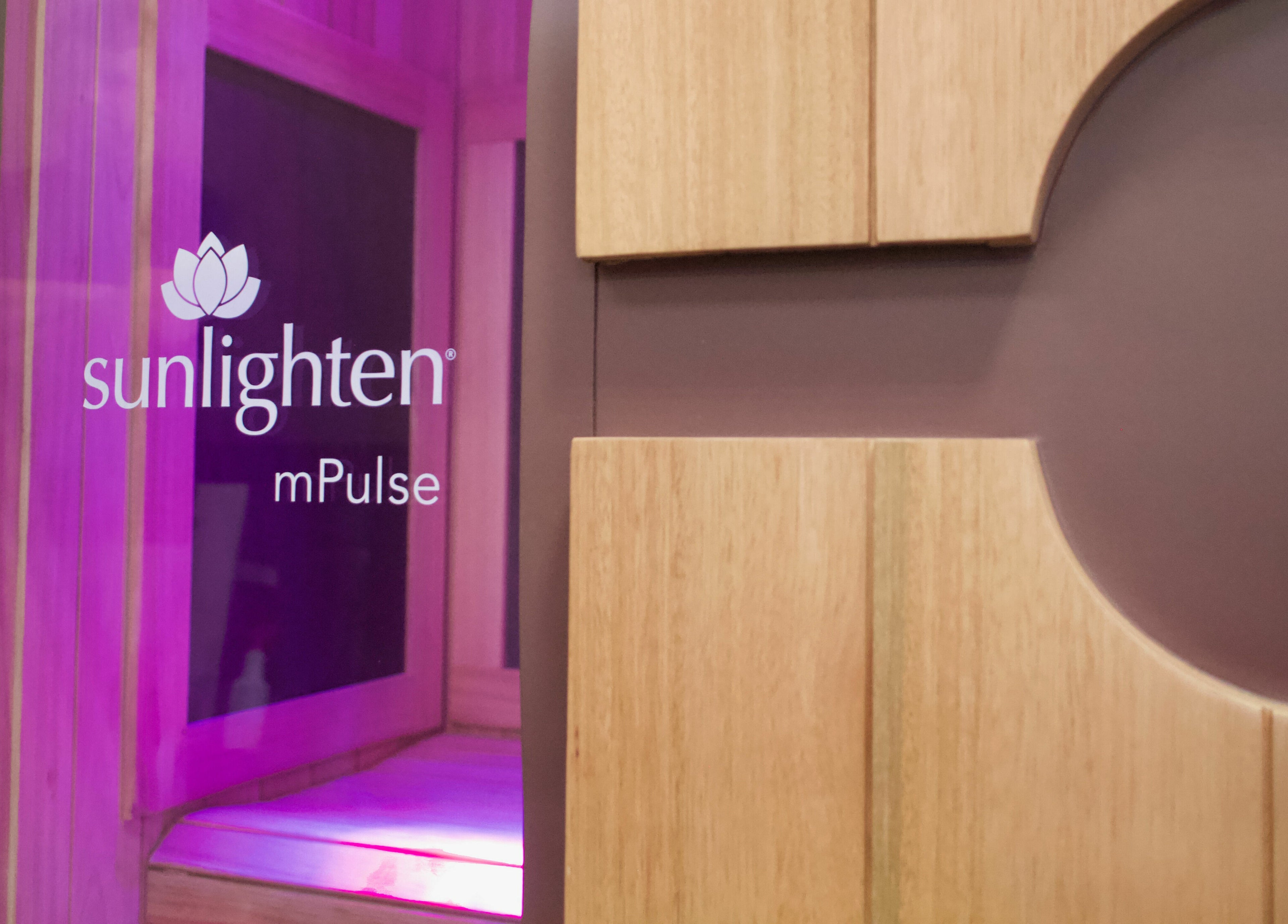 Konza Saunas infrared unit in Manhattan, Kansas, US, showcasing a modern, relaxing spa ambiance with warm lighting.