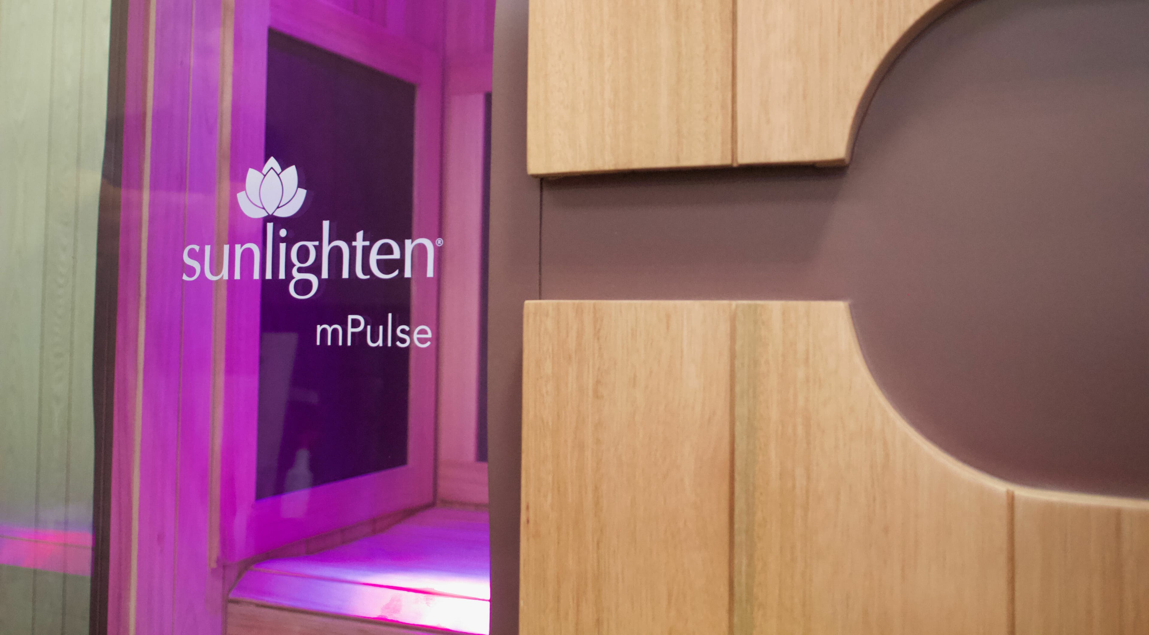 Konza Saunas infrared unit in Manhattan, Kansas, US, showcasing a modern, relaxing spa ambiance with warm lighting.