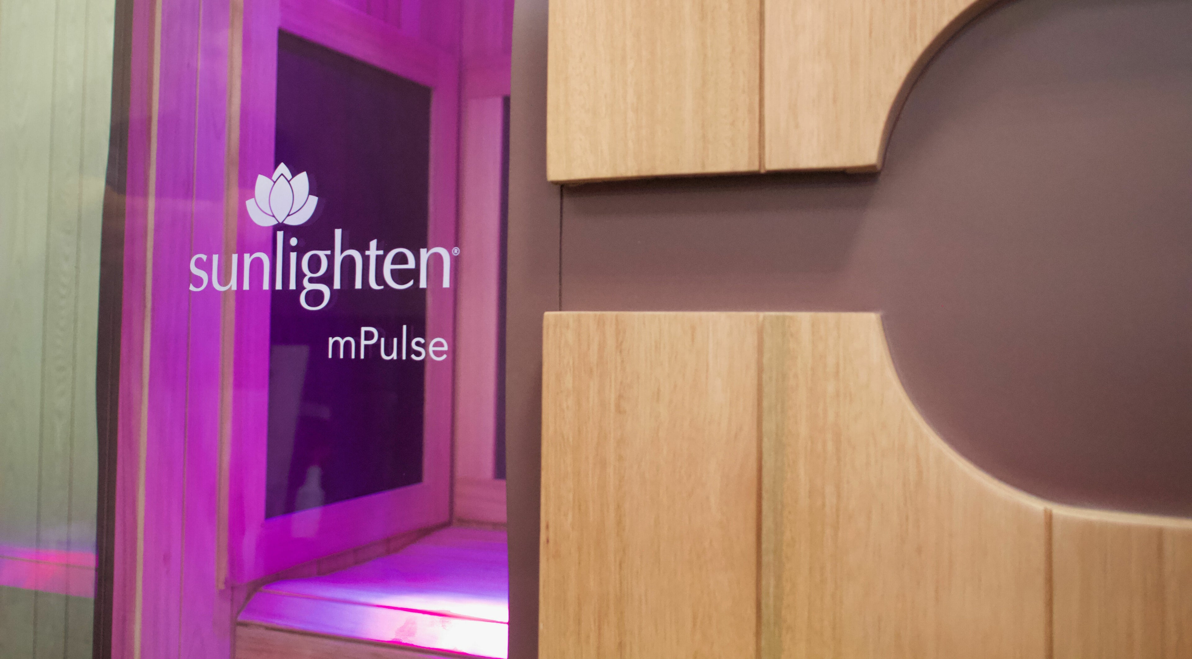 Konza Saunas infrared unit in Manhattan, Kansas, US, showcasing a modern, relaxing spa ambiance with warm lighting.