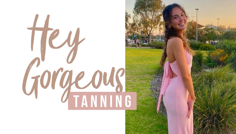 A woman in pink at Hey Gorgeous Spray Tanning, Wattle Grove, Western Australia, AU, exuding natural radiance.