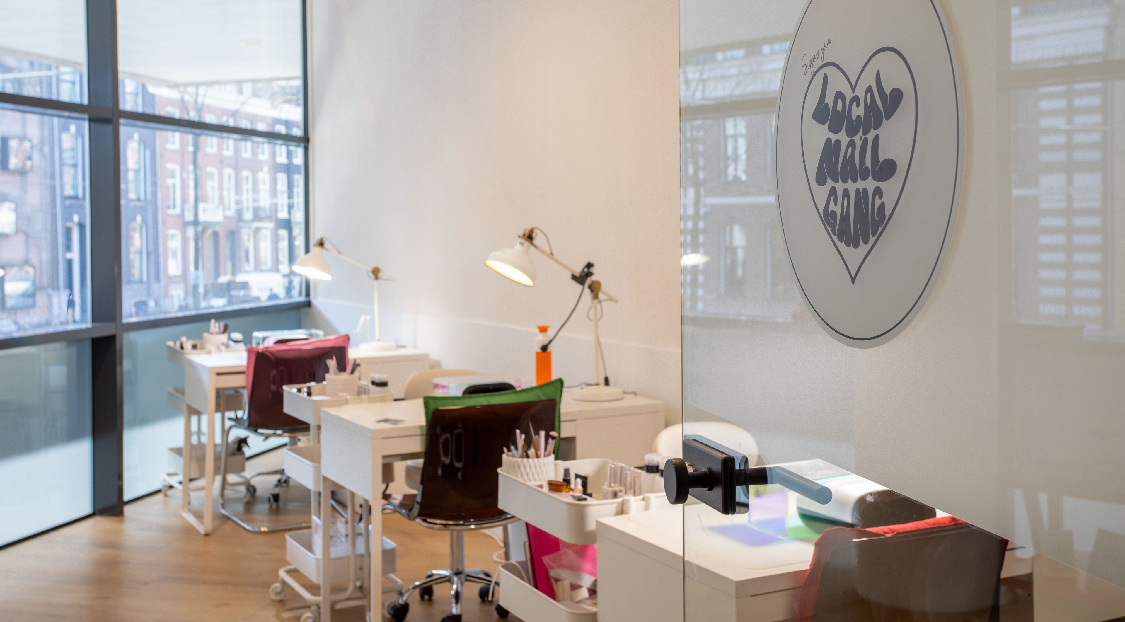 Elegant interior of Local Nail Gang in Amsterdam, Noord-Holland, NL showcasing modern nail stations.