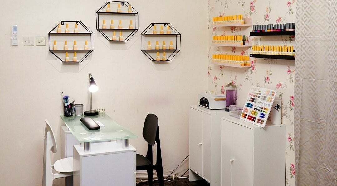 Elegant nail care station at Brows and More Salon in Dubai, Dubai, AE with modern decor and organized polishes.