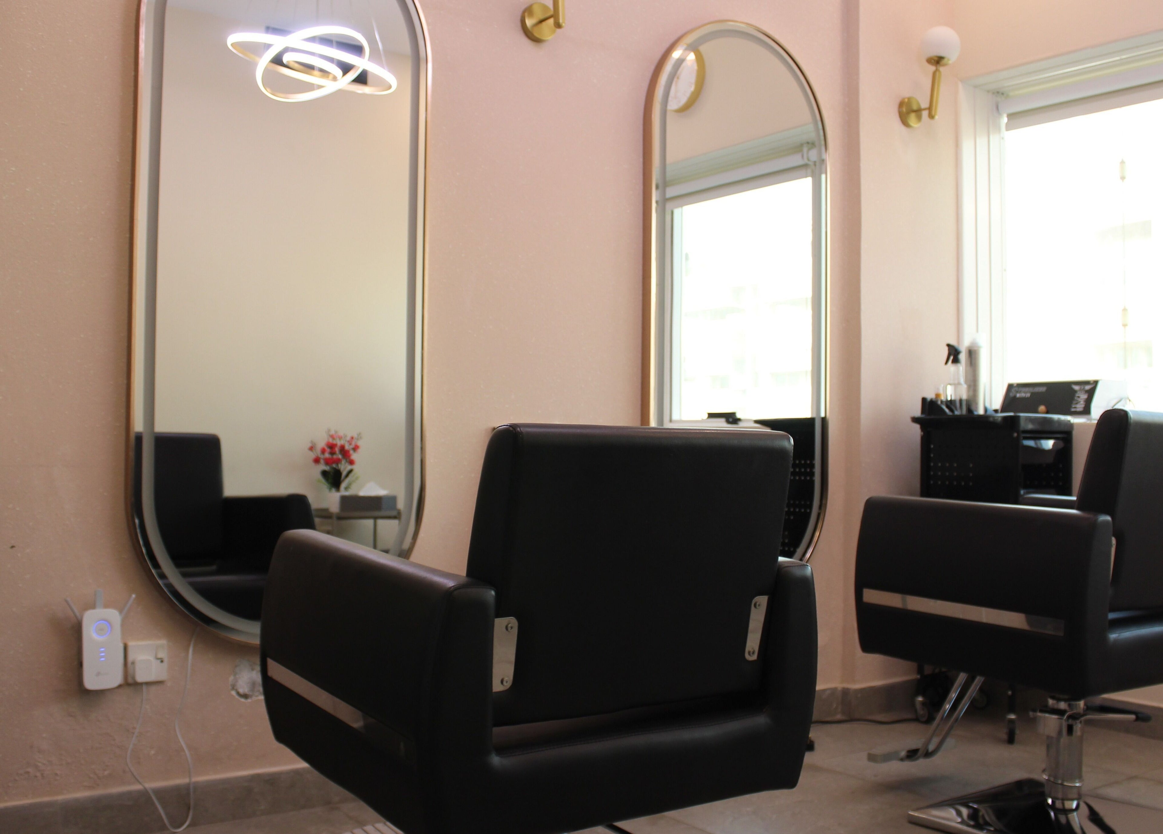 Elegant styling chairs at Brows and More (Karama) in Dubai, Dubai, AE, offering a chic beauty experience.