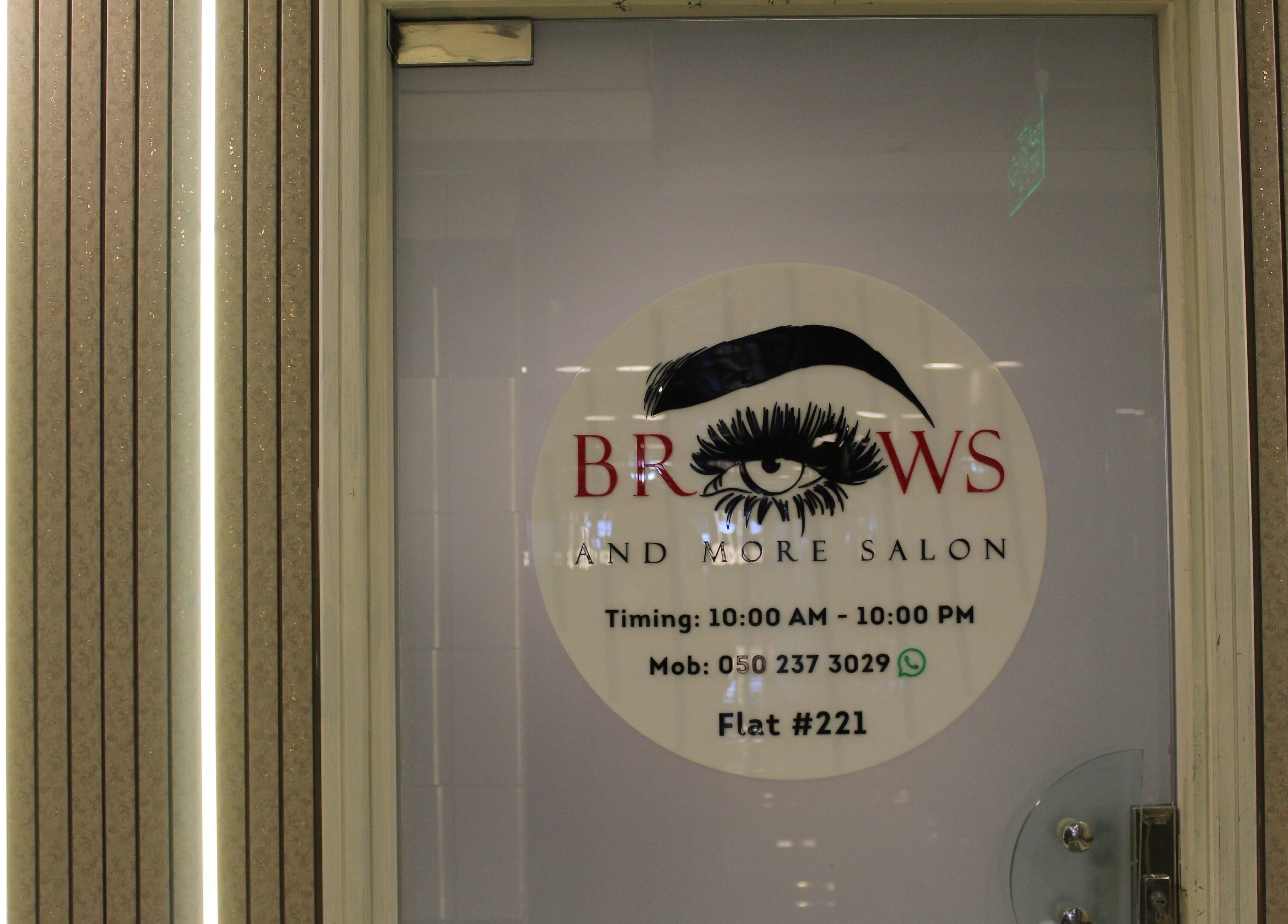 Entrance of Brows and More (Karama) in Dubai, Dubai, AE with logo and contact details on the door.