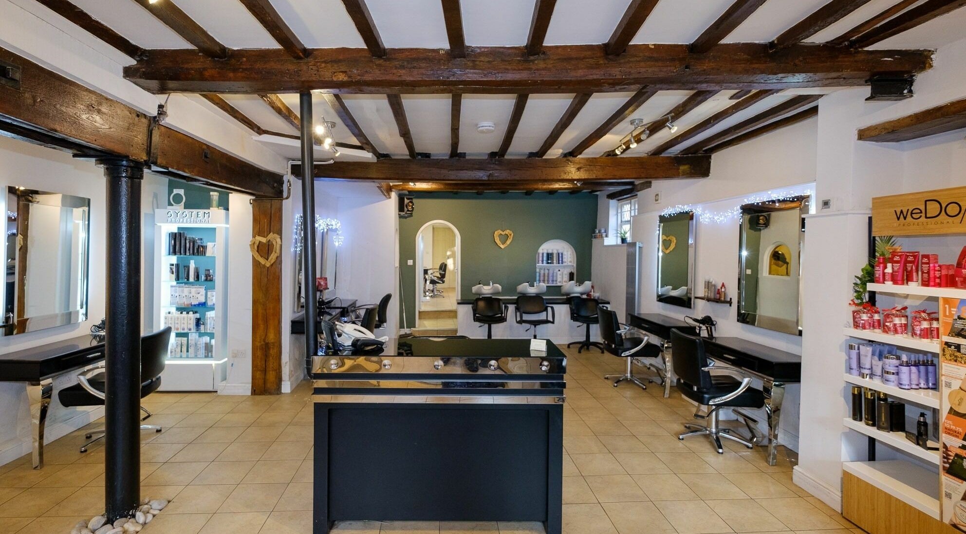 Head Candy's stylish salon interior in Market Harborough, England, GB, featuring elegant workstations.