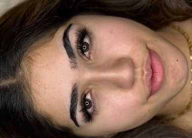 Client with stunning eyelashes at Hypnotic Studio, Melbourne, Victoria, AU, showcasing expert beauty services.