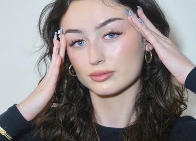 Woman with flawless makeup at Hypnotic Studio Lash & Brow Studio—Flinders Lane, Melbourne, Victoria, AU.