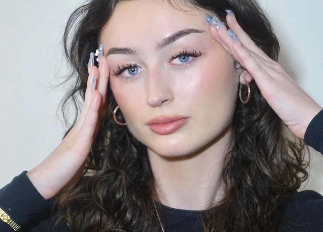 Woman with flawless makeup at Hypnotic Studio Lash & Brow Studio—Flinders Lane, Melbourne, Victoria, AU.