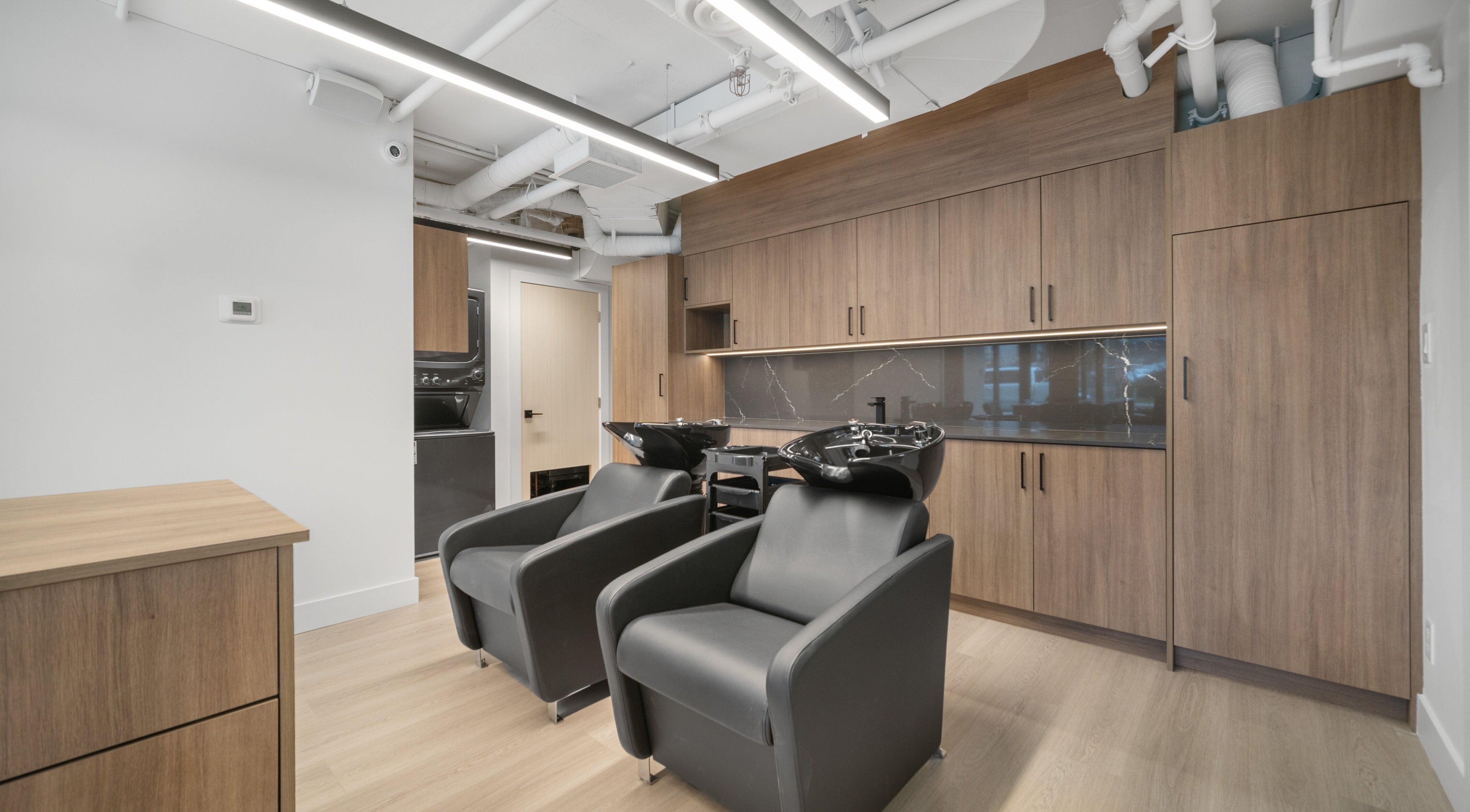 Sleek salon washing stations at Glamour Touch Studio Inc., White Rock, British Columbia, CA.