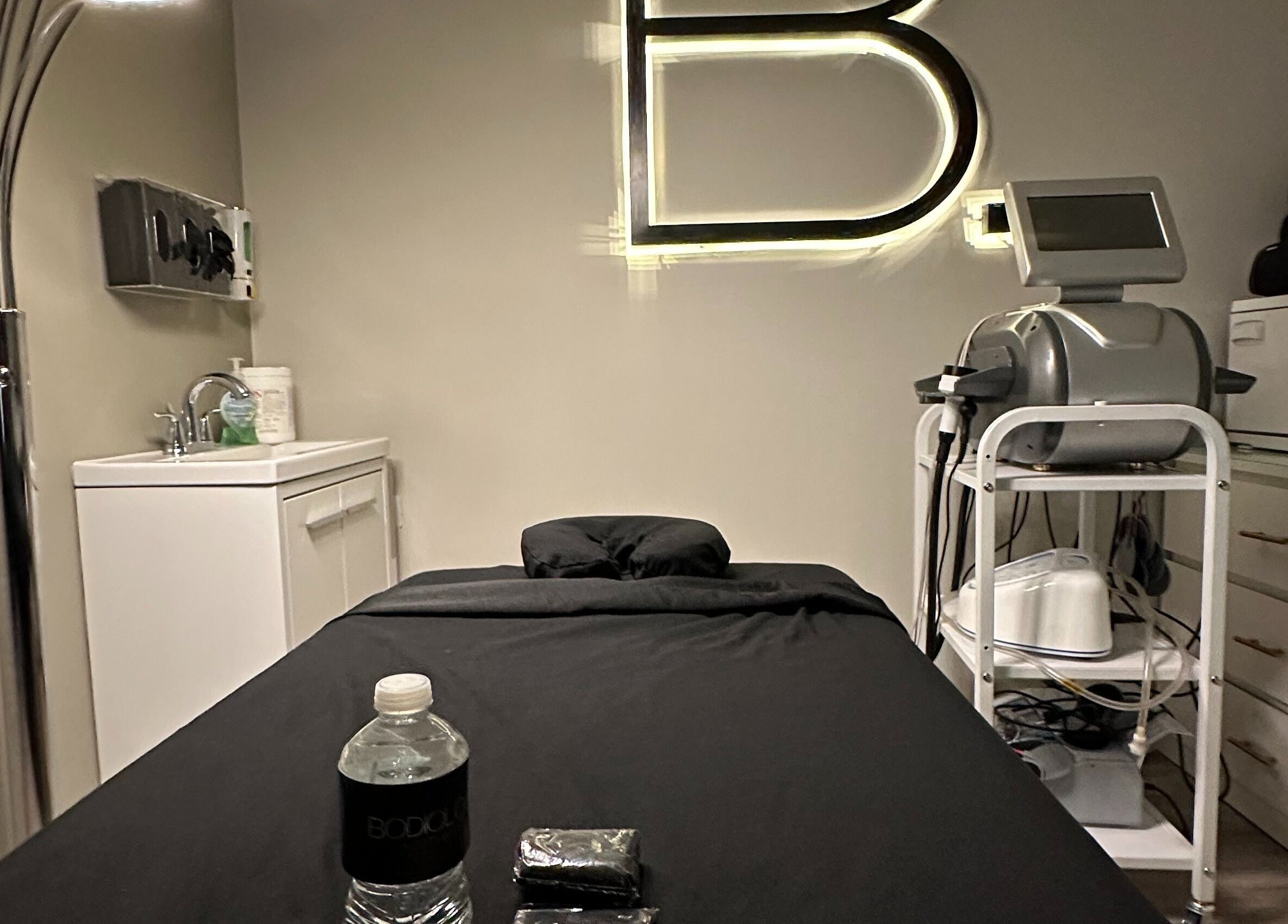 Bodiology Aesthetics' calming treatment room in Calgary, Alberta, CA, offering a relaxing wellness experience.