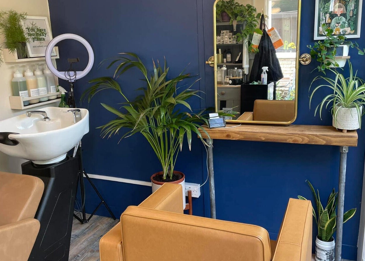 Chic hair styling station at My Space se, Whitstable, England, GB, with modern decor and plant accents.