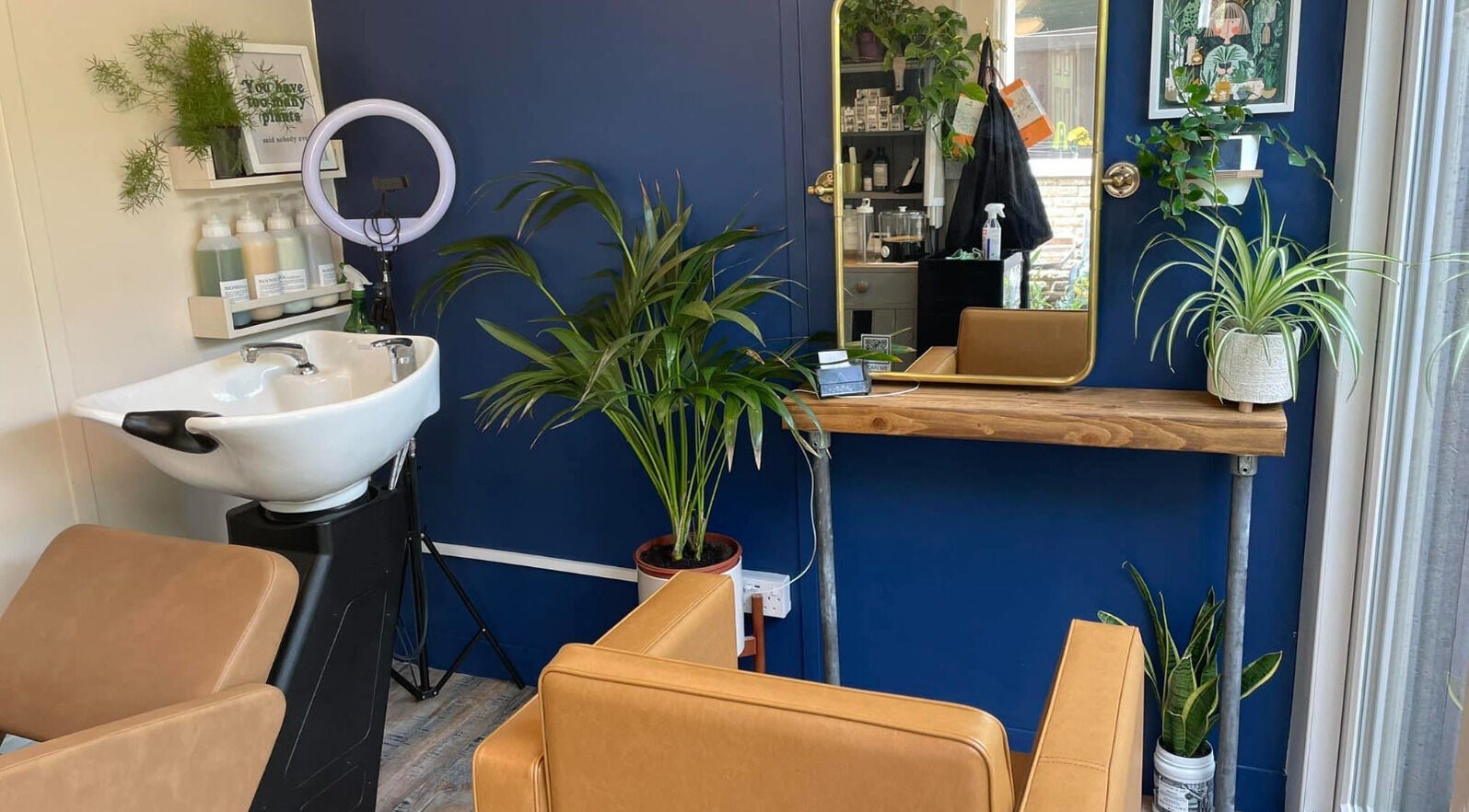 Chic hair styling station at My Space se, Whitstable, England, GB, with modern decor and plant accents.