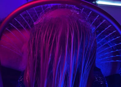 Relaxing hair treatment with vibrant lights at SAHD Spa Clinic, Newcastle Upon Tyne, England, GB.