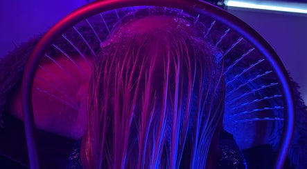 Luxurious hair treatment at SAHD Spa Clinic - Chopwell, Newcastle Upon Tyne, England, GB under neon lights.