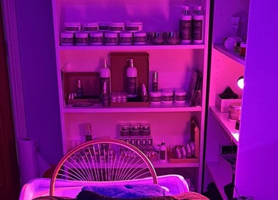 Relaxing spa shelves at SAHD Spa Clinic - Chopwell, Newcastle Upon Tyne, England, GB with purple ambiance lighting.