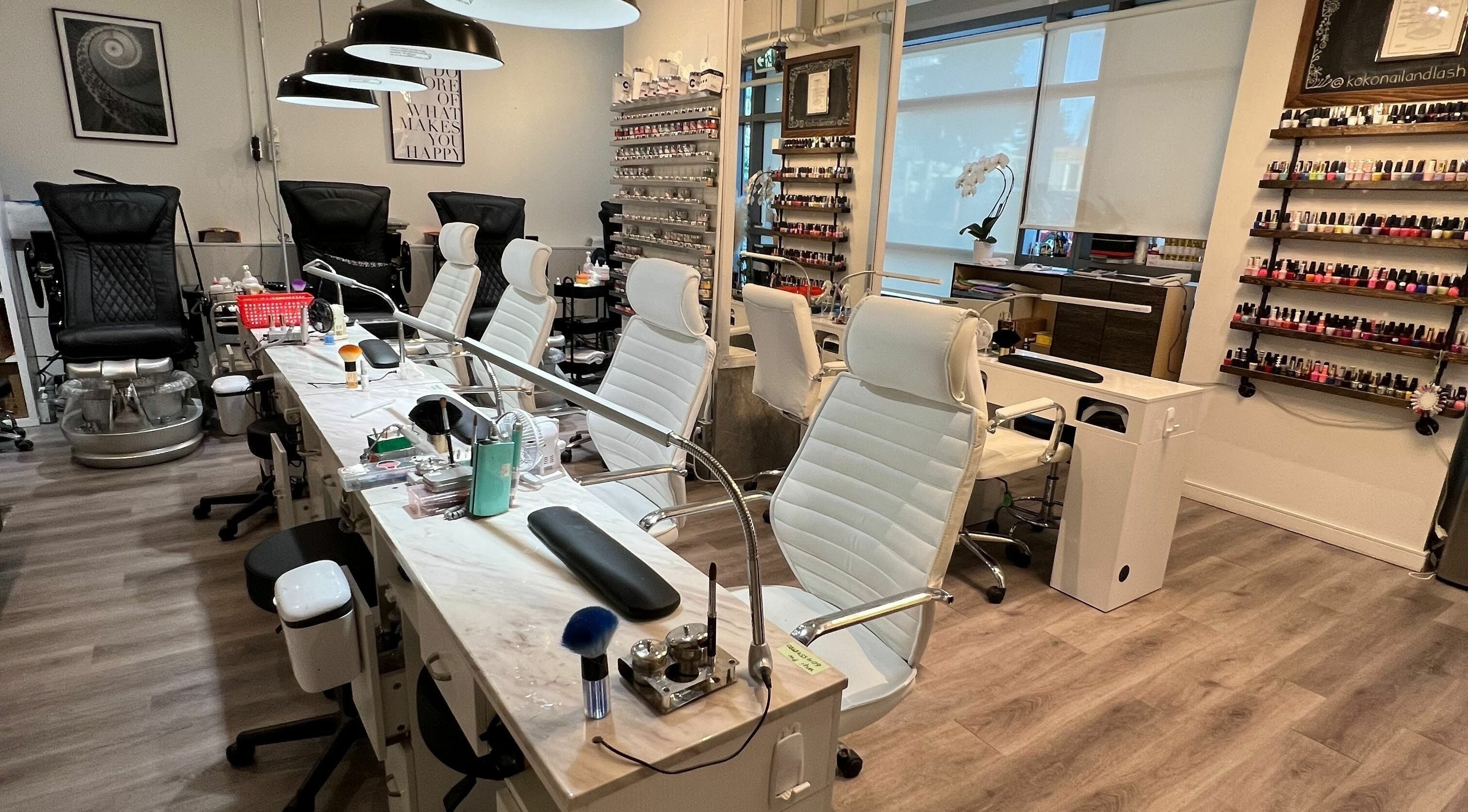 Stylish nail salon interior at Koko Nail And Lash, Burnaby, British Columbia, CA showcasing modern decor and equipment.