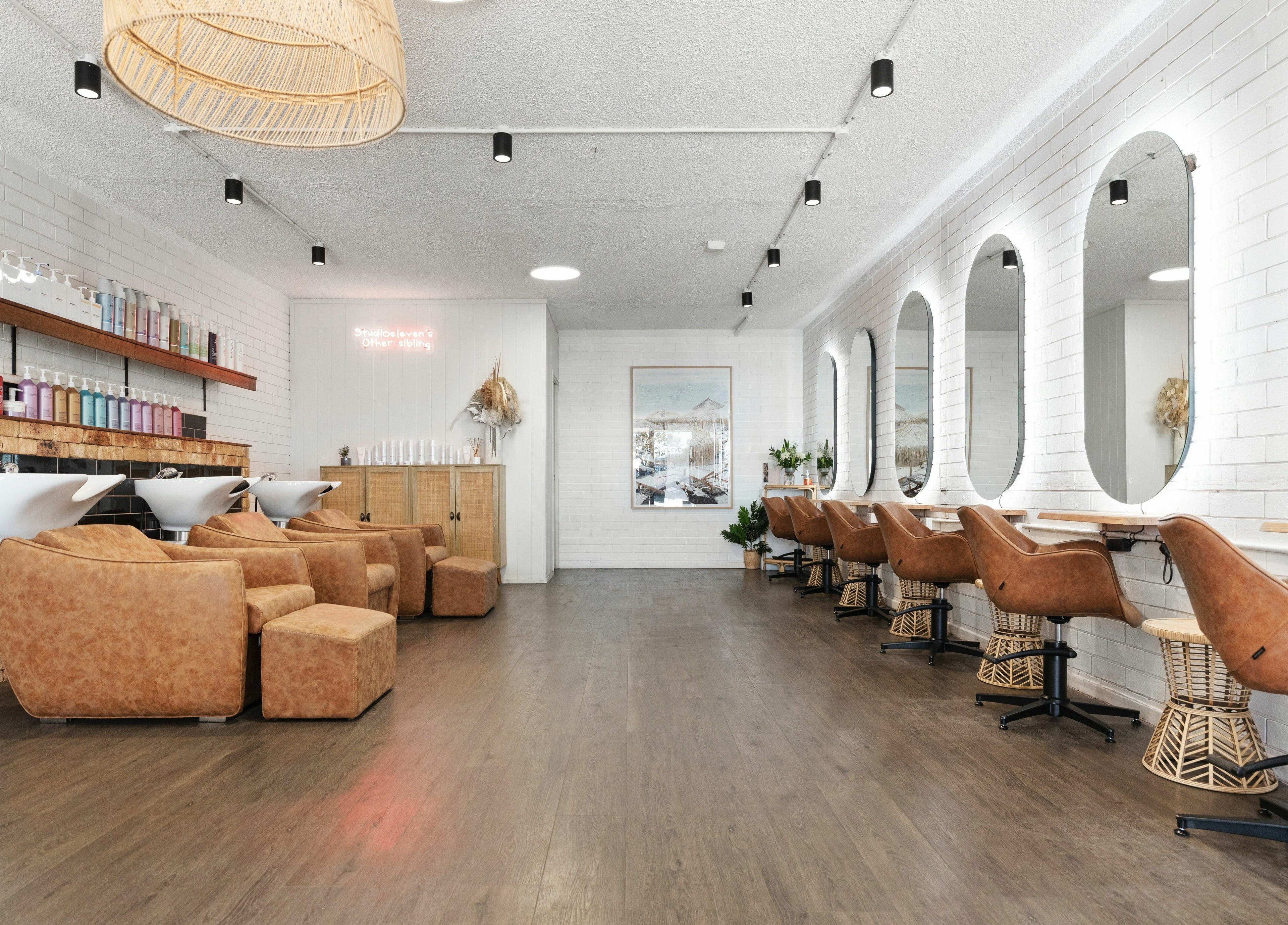 Elegant interior of Studio Eleven - Kingscliff, featuring stylish chairs and mirrors in Kingscliff, New South Wales, AU.