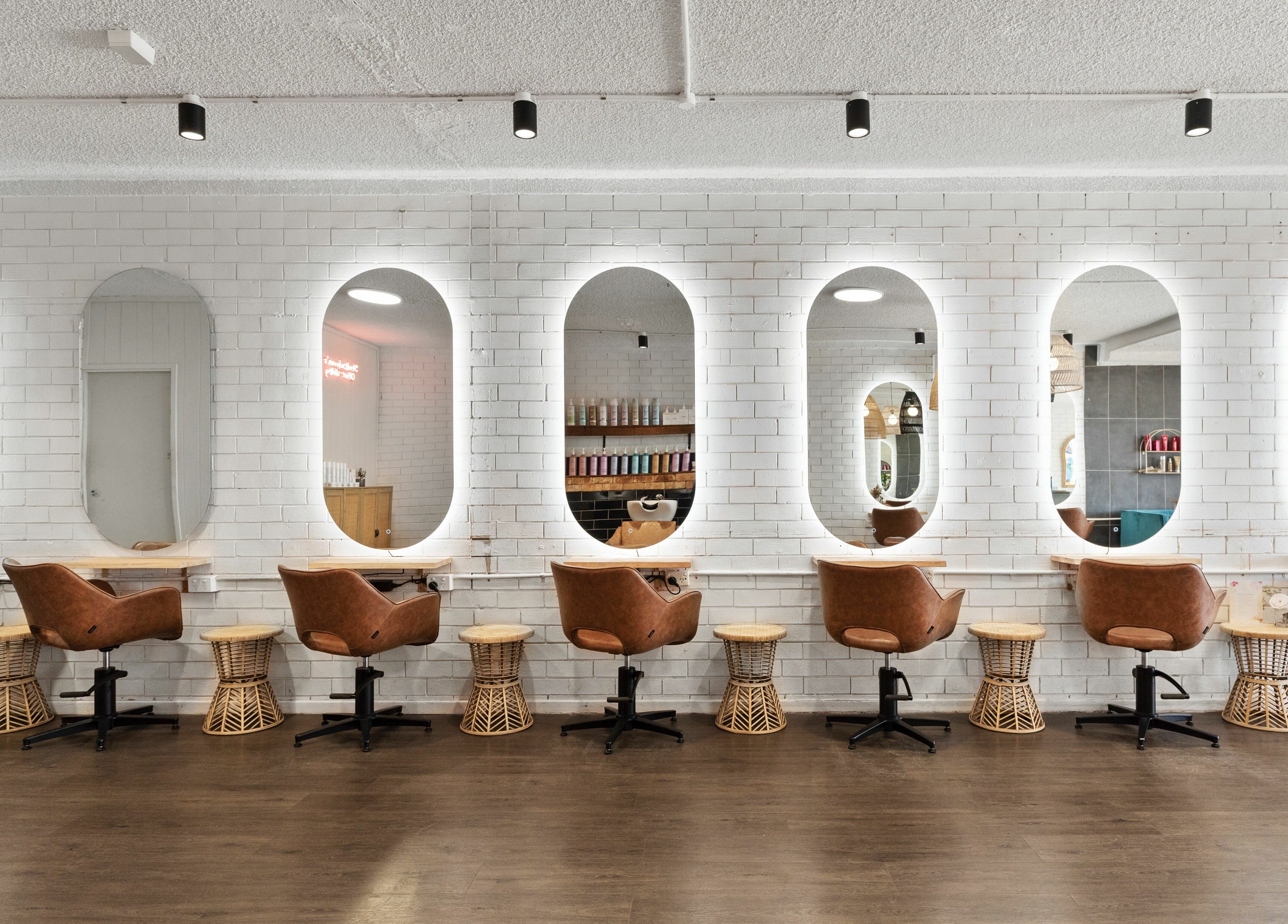 Elegant salon seating and mirrors at Studio Eleven - Kingscliff in Kingscliff, New South Wales, AU.