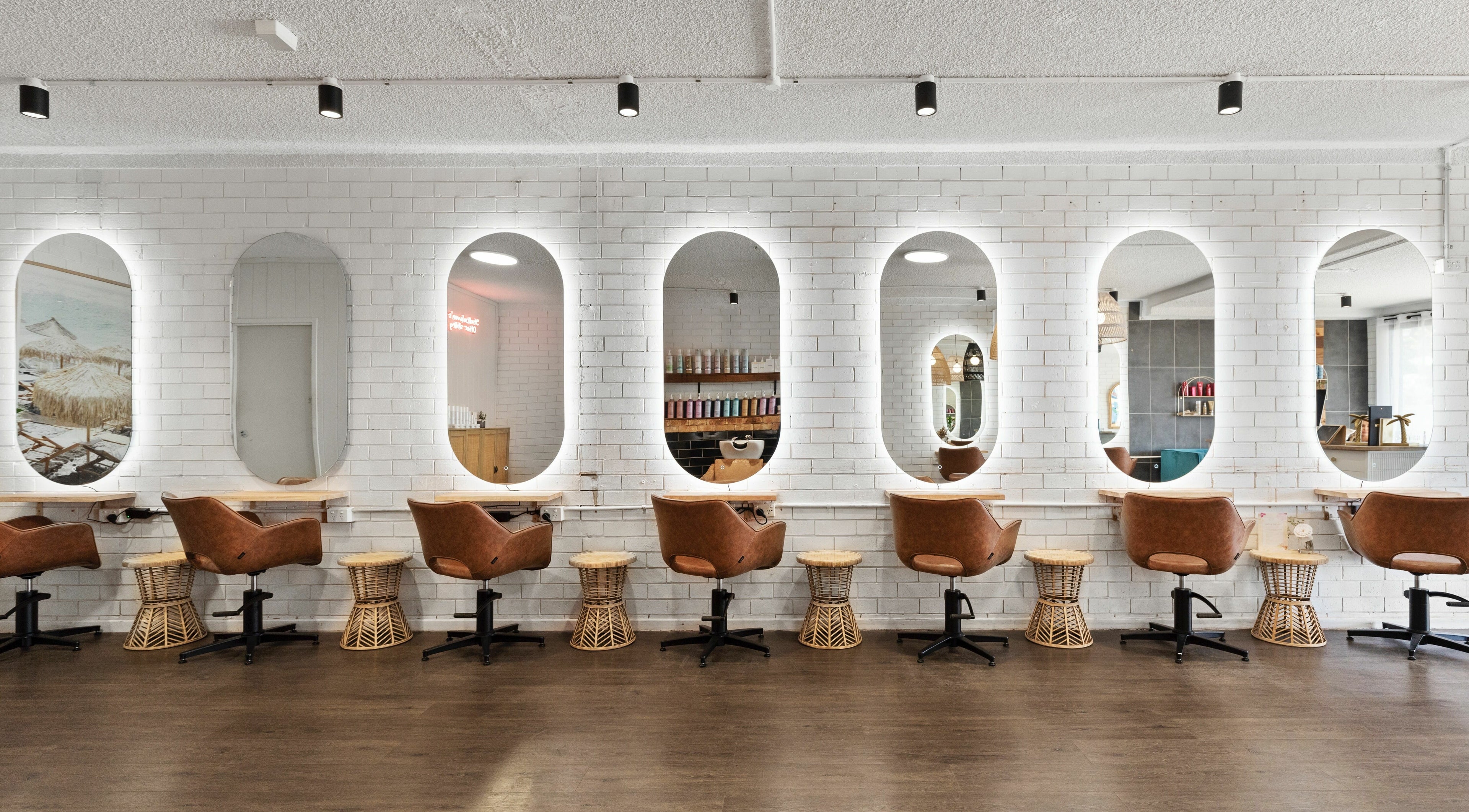 Elegant salon seating and mirrors at Studio Eleven - Kingscliff in Kingscliff, New South Wales, AU.
