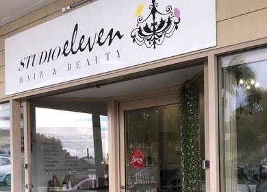 Front entrance of Studio Eleven - Banora Point, Banora Point, New South Wales, AU, with signage and display window.