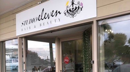 Front entrance of Studio Eleven - Banora Point, Banora Point, New South Wales, AU, with signage and display window.