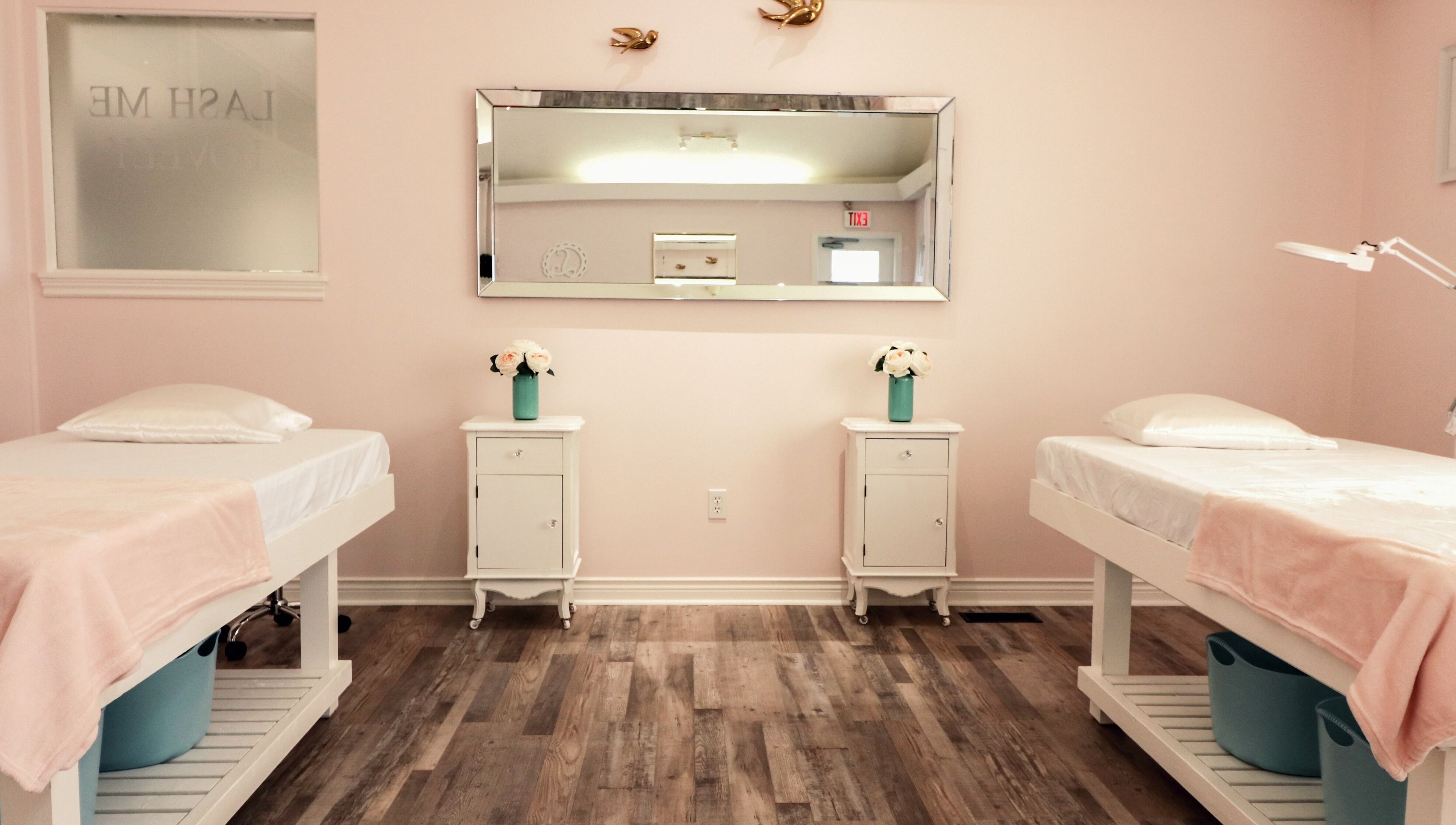 Chic interior of Lash Me Lovely - Couture Extensions Salon in Waterdown, Ontario, CA with two cozy treatment beds.